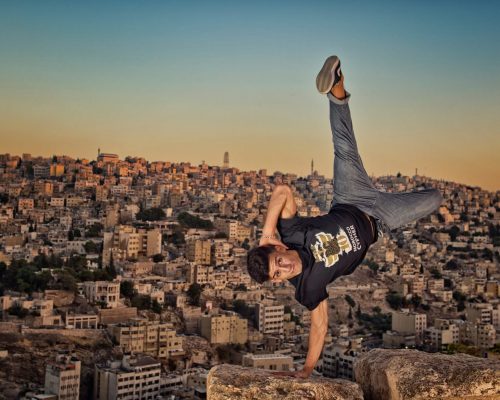 Lil Zoo poses for a photo in the Roman Citadele in front of the skyline in Amman, Jordan, one day after winning Red Bull BC One Middle East Africa Final on August 31, 2013.